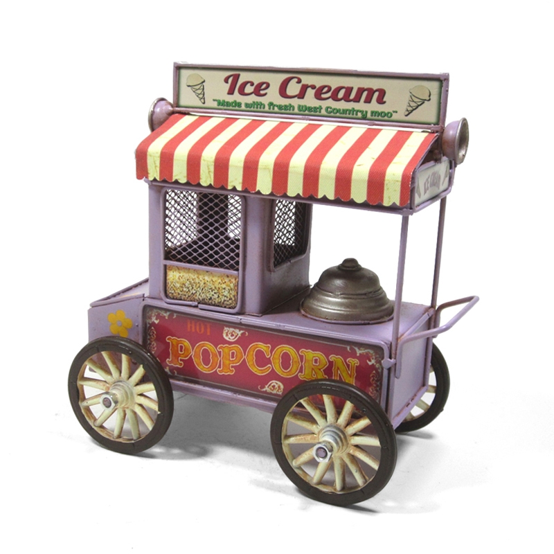 Καντίνα Pop corn - 15 εκ. Διακοσμητική μεταλλική καντίνα παγωτατζίδικο και ποπκόρν. Λατρεύετε τη ρετρό και vintage διακόσμηση των δεκαετιών '50 & '60; Εμπλουτίστε τη διακόσμησή σας με την πιο χαριτωμένη προσθήκη που θα σας ταξιδεύει νοερά στην μαγική εποχή της καντίνας. Η όμορφη μεταλλική κατασκευή μιμείται ρετρό παγωτατζίδικο και popcorn μηχάνημα σε εντυπωσιακές λιλά αποχρώσεις με κόκκινες λεπτομέρειες. Ιδανική επιλογή για να κερδίσει τα βλέμματα στον προσωπικό σας χώρο ή το κατάστημά σας. Ρετρό σχεδίαση. Μεταλλική κατασκευή. Διαστάσεις κατά προσέγγιση: 15 εκ. μήκος x 7 εκ. πλάτος x 16 εκ. ύψος. kantina-pop-corn